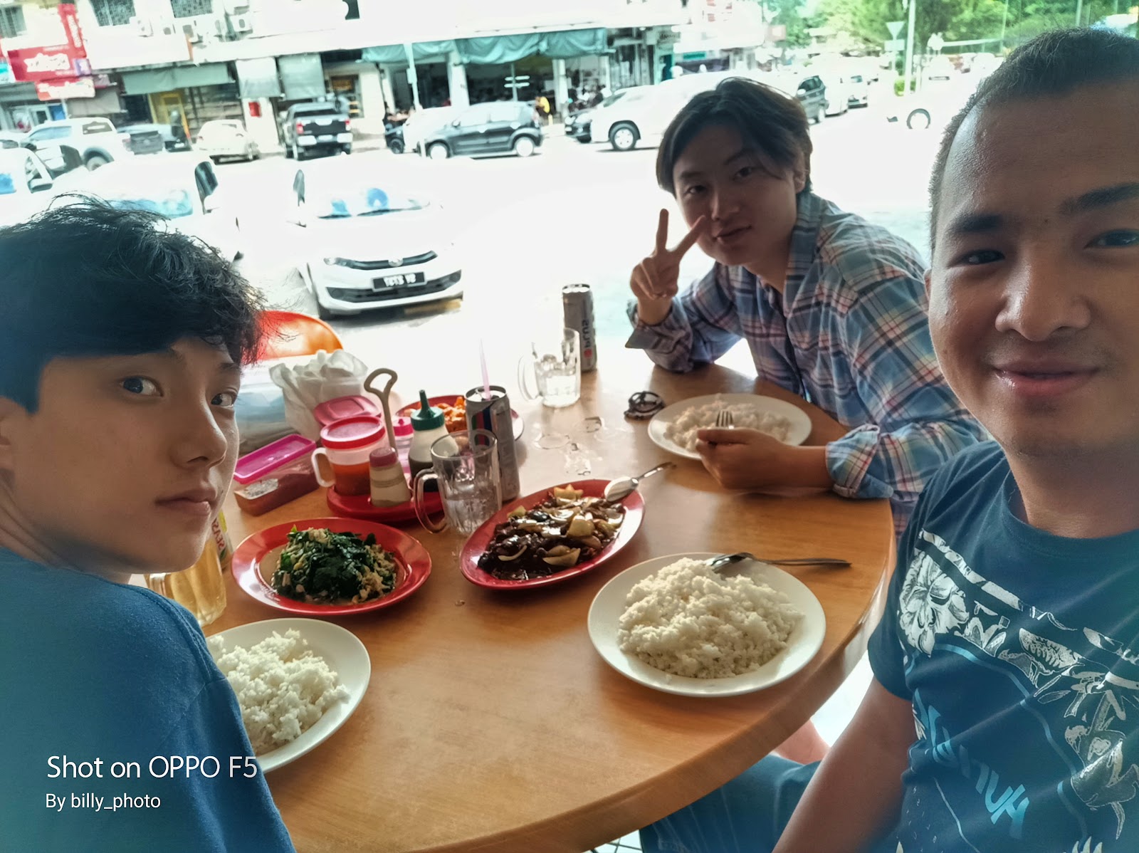 Guests sharing a meal in Kota Kinabalu