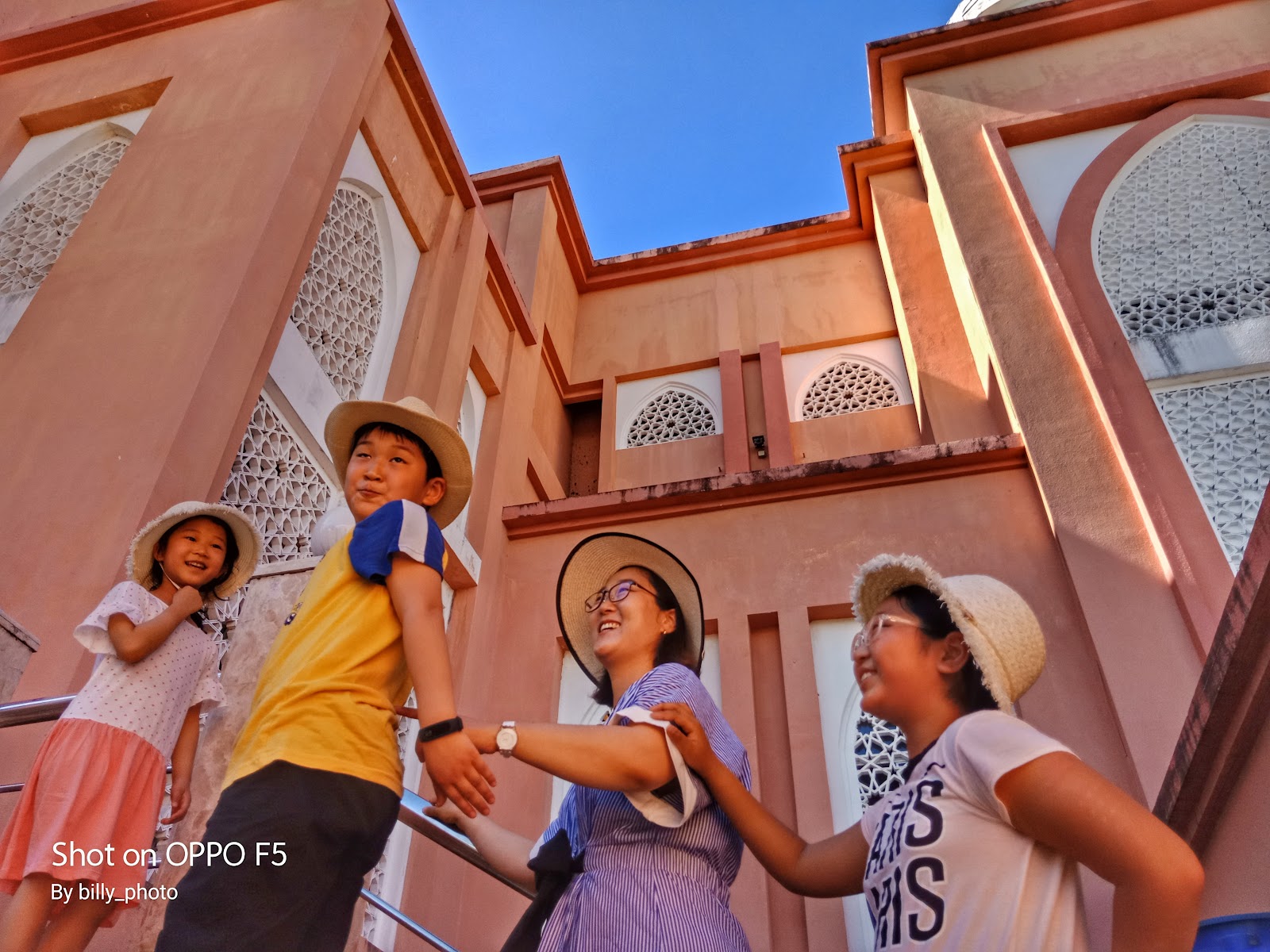 Family visiting the Pink Mosque